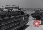 Image of U.S. war supplies come ashore at Normandy after D-Day Normandy France, 1944, second 53 stock footage video 65675037056