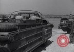 Image of U.S. war supplies come ashore at Normandy after D-Day Normandy France, 1944, second 54 stock footage video 65675037056