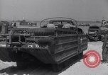 Image of U.S. war supplies come ashore at Normandy after D-Day Normandy France, 1944, second 56 stock footage video 65675037056