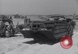 Image of U.S. war supplies come ashore at Normandy after D-Day Normandy France, 1944, second 58 stock footage video 65675037056