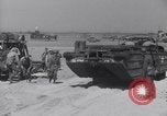 Image of U.S. war supplies come ashore at Normandy after D-Day Normandy France, 1944, second 59 stock footage video 65675037056