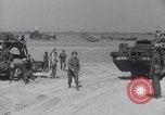 Image of U.S. war supplies come ashore at Normandy after D-Day Normandy France, 1944, second 61 stock footage video 65675037056