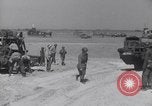 Image of U.S. war supplies come ashore at Normandy after D-Day Normandy France, 1944, second 62 stock footage video 65675037056