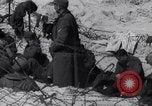 Image of U.S. troops hold German POWs on Normandy beach in World War II Normandy France, 1944, second 41 stock footage video 65675037057