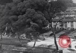 Standbild bombardiert Ölversorgung Depot Vereinigtes Königreich, 1944, aus Sekunde 16 historischem Filmmaterial Videoclip 65675037073