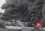 Standbild bombardiert Ölversorgung Depot Vereinigtes Königreich, 1944, aus Sekunde 24 historischem Filmmaterial Videoclip 65675037073