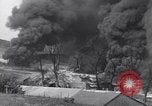 Standbild bombardiert Ölversorgung Depot Vereinigtes Königreich, 1944, aus Sekunde 25 historischem Filmmaterial Videoclip 65675037073