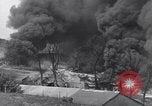 Standbild bombardiert Ölversorgung Depot Vereinigtes Königreich, 1944, aus Sekunde 26 historischem Filmmaterial Videoclip 65675037073