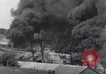 Standbild bombardiert Ölversorgung Depot Vereinigtes Königreich, 1944, aus Sekunde 28 historischem Filmmaterial Videoclip 65675037073