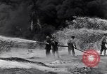 Standbild bombardiert Ölversorgung Depot Vereinigtes Königreich, 1944, aus Sekunde 31 historischem Filmmaterial Videoclip 65675037073