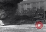 Image of bombed oil supply depot United Kingdom, 1944, second 25 stock footage video 65675037075
