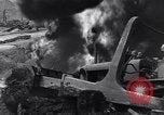 Image of bombed oil supply depot United Kingdom, 1944, second 58 stock footage video 65675037075