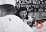 Image of Scenes in city a year after Japanese attack on Pearl Harbor Honolulu Hawaii USA, 1942, second 1 stock footage video 65675037124