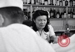 Image of Scenes in city a year after Japanese attack on Pearl Harbor Honolulu Hawaii USA, 1942, second 9 stock footage video 65675037124