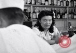 Image of Scenes in city a year after Japanese attack on Pearl Harbor Honolulu Hawaii USA, 1942, second 10 stock footage video 65675037124