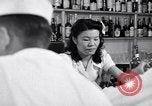 Image of Scenes in city a year after Japanese attack on Pearl Harbor Honolulu Hawaii USA, 1942, second 11 stock footage video 65675037124