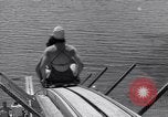 Standbild Mädchen im Wasser Park Enfield Maine USA, 1938, aus Sekunde 18 historischem Filmmaterial Videoclip 65675037137