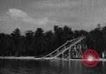 Standbild Mädchen im Wasser Park Enfield Maine USA, 1938, aus Sekunde 19 historischem Filmmaterial Videoclip 65675037137