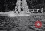 Standbild Mädchen im Wasser Park Enfield Maine USA, 1938, aus Sekunde 35 historischem Filmmaterial Videoclip 65675037137