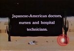 Immagine di Japanese-American medici e infermieri presso un centro di rilocazione United States USA, 1940, secondo 1 filmato di repertorio 65675037172