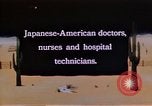 Immagine di Japanese-American medici e infermieri presso un centro di rilocazione United States USA, 1940, secondo 3 filmato di repertorio 65675037172