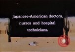 Immagine di Japanese-American medici e infermieri presso un centro di rilocazione United States USA, 1940, secondo 4 filmato di repertorio 65675037172