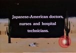 Immagine di Japanese-American medici e infermieri presso un centro di rilocazione United States USA, 1940, secondo 5 filmato di repertorio 65675037172