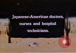 Immagine di Japanese-American medici e infermieri presso un centro di rilocazione United States USA, 1940, secondo 6 filmato di repertorio 65675037172