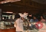 Standbild diverse Geschäfte am Markt Vietnam, 1967, aus Sekunde 37 historischem Filmmaterial Videoclip 65675037263
