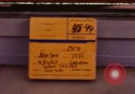 Image of signboards of various shops and services Saigon Vietnam, 1967, second 1 stock footage video 65675037265