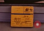 Image of signboards of various shops and services Saigon Vietnam, 1967, second 3 stock footage video 65675037265