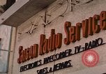 Image of signboards of various shops and services Saigon Vietnam, 1967, second 8 stock footage video 65675037265