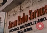 Image of signboards of various shops and services Saigon Vietnam, 1967, second 11 stock footage video 65675037265