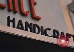 Image of signboards of various shops and services Saigon Vietnam, 1967, second 14 stock footage video 65675037265