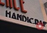Image of signboards of various shops and services Saigon Vietnam, 1967, second 15 stock footage video 65675037265
