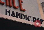 Image of signboards of various shops and services Saigon Vietnam, 1967, second 16 stock footage video 65675037265