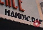 Image of signboards of various shops and services Saigon Vietnam, 1967, second 18 stock footage video 65675037265