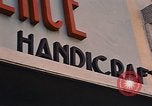 Image of signboards of various shops and services Saigon Vietnam, 1967, second 20 stock footage video 65675037265