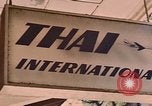Image of signboards of various shops and services Saigon Vietnam, 1967, second 29 stock footage video 65675037265