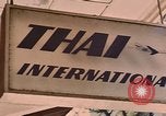 Image of signboards of various shops and services Saigon Vietnam, 1967, second 31 stock footage video 65675037265