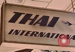 Image of signboards of various shops and services Saigon Vietnam, 1967, second 32 stock footage video 65675037265