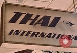 Image of signboards of various shops and services Saigon Vietnam, 1967, second 33 stock footage video 65675037265