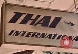 Image of signboards of various shops and services Saigon Vietnam, 1967, second 34 stock footage video 65675037265