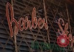 Image of signboards of various shops and services Saigon Vietnam, 1967, second 38 stock footage video 65675037265