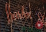 Image of signboards of various shops and services Saigon Vietnam, 1967, second 39 stock footage video 65675037265