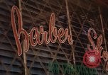 Image of signboards of various shops and services Saigon Vietnam, 1967, second 40 stock footage video 65675037265