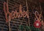 Image of signboards of various shops and services Saigon Vietnam, 1967, second 41 stock footage video 65675037265