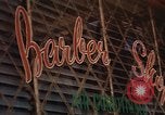 Image of signboards of various shops and services Saigon Vietnam, 1967, second 42 stock footage video 65675037265