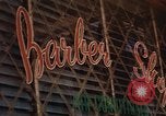 Image of signboards of various shops and services Saigon Vietnam, 1967, second 43 stock footage video 65675037265