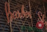 Image of signboards of various shops and services Saigon Vietnam, 1967, second 44 stock footage video 65675037265